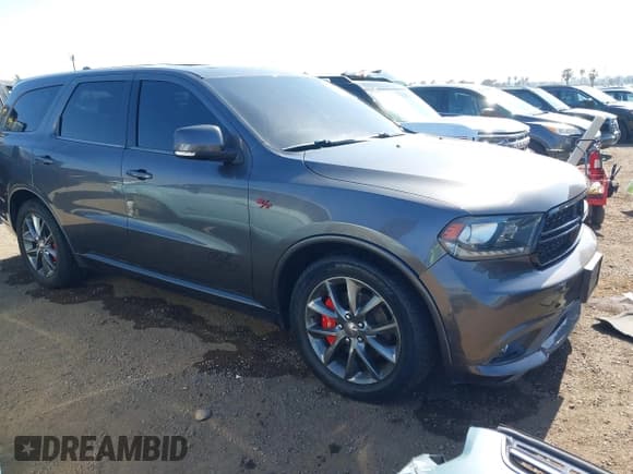 ✅ 2014 Dodge Durango R/T • VIN: 1C4SDJCT5EC591649 • Lot: 42346947. Listed on IAAI with 143,143 mi. Free auction sales archive from the USA and detailed vehicle history report at DreamBid. Image 1.