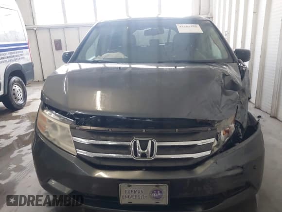 ✅ 2012 Honda Odyssey Touring • VIN: 5FNRL5H92CB106325 • Lot: 43287538. Listed on IAAI with 206,962 mi. Free auction sales archive from the USA and detailed vehicle history report at DreamBid. Image 12.