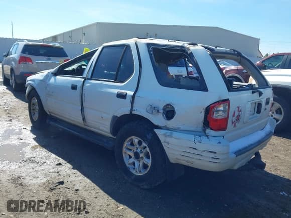 ✅ 2004 Isuzu Rodeo S • VIN: 4S2CK58W944315203 • Lot: 41355461. Listed on IAAI with Not provided. Free auction sales archive from the USA and detailed vehicle history report at DreamBid. Image 3.