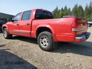 2003 Dodge Dakota Sport z VIN 1D7HL38NX3S350049, wystawiony jako Copart lot #70331774 z przebiegiem 159 215 mil mil oraz Szkoda całkowita • Salvage title. Historia ofert i sprzedaży dostępna na DreamBid. Obrazek 2.