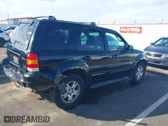 ✅ 2005 Ford Escape Limited • VIN: 1FMYU94125KA49934 • Lot: 41735243. Listed on IAAI with 118,041 mi. Free auction sales archive from the USA and detailed vehicle history report at DreamBid. Image 4.