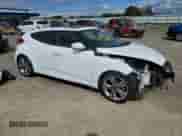 2017 Hyundai Veloster z VIN KMHTC6AD9HU316618, wystawiony jako Copart lot #70060254 z przebiegiem 76 823 mil mil oraz Czysty tytuł • Clean title. Historia ofert i sprzedaży dostępna na DreamBid. Obrazek 4.