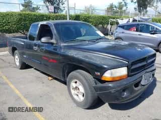 1999 Dodge Dakota SLT z VIN 1B7GL22Y0XS250177, wystawiony jako IAAI lot #40592532 z przebiegiem Nie podano mil oraz . Historia ofert i sprzedaży dostępna na DreamBid. Obrazek 1.