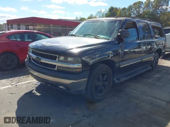 ✅ 2003 Chevrolet Suburban LS • VIN: 3GNEC16ZX3G123952 • Lot: 43382082. Listed on IAAI with 219,368 mi. Free auction sales archive from the USA and detailed vehicle history report at DreamBid. Image 2.
