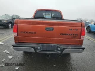 ✅ 2003 Dodge Dakota • VIN: 1D7GG16X13S167082 • Lot: 84377024. Wystawiony na Copart z przebiegiem 81 292 mil. Bezpłatny archiwum sprzedaży aukcyjnych z USA i szczegółowy raport historii pojazdu na DreamBid. Zdjęcie 6.