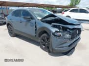 ✅ 2025 Mazda CX-30 S Carbon Edition • VIN: 3MVDMBCM8SM806487 • Lot: 42579926. Wystawiony na IAAI z przebiegiem 3 161 mil. Bezpłatny archiwum sprzedaży aukcyjnych z USA i szczegółowy raport historii pojazdu na DreamBid. Zdjęcie 17.