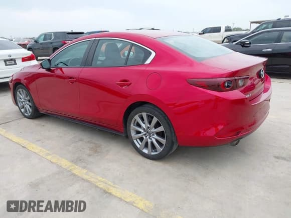 ✅ 2022 Mazda 3 Select • VIN: 3MZBPABL9NM316998 • Lot: 42117951. Listed on IAAI with 44,594 mi. Free auction sales archive from the USA and detailed vehicle history report at DreamBid. Image 3.