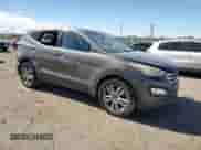 2013 Hyundai Santa Fe Sport z VIN 5XYZW3LA7DG045304, wystawiony jako Copart lot #89658015 z przebiegiem 147 599 mil mil oraz Szkoda całkowita • Salvage title. Historia ofert i sprzedaży dostępna na DreamBid. Obrazek 4.