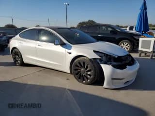 ✅ 2021 Tesla Model 3 Performance • VIN: 5YJ3E1EC3MF988518 • Lot: 86864575. Listed on Copart with 80,502 mi. Free auction sales archive from the USA and detailed vehicle history report at DreamBid. Image 4.