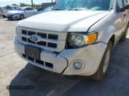 ✅ 2011 Ford Escape Hybrid • VIN: 1FMCU4K33BKB91464 • Lot: 43121446. Wystawiony na IAAI z przebiegiem 128 342 mil. Bezpłatny archiwum sprzedaży aukcyjnych z USA i szczegółowy raport historii pojazdu na DreamBid. Zdjęcie 6.