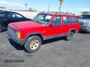 ✅ 1996 Jeep Cherokee Sport • VIN: 1J4FT68S0TL225719 • Lot: 42121351. Listed on IAAI with 237,602 mi. Free auction sales archive from the USA and detailed vehicle history report at DreamBid. Image 2.