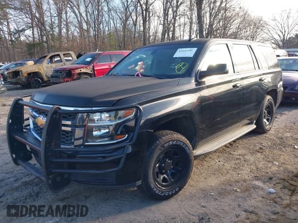 ✅ 2015 Chevrolet Tahoe Commercial • VIN: 1GNLC2EC4FR535329 • Lot: 41643486. Listed on IAAI with 185,326 mi. Free auction sales archive from the USA and detailed vehicle history report at DreamBid. Image 2.