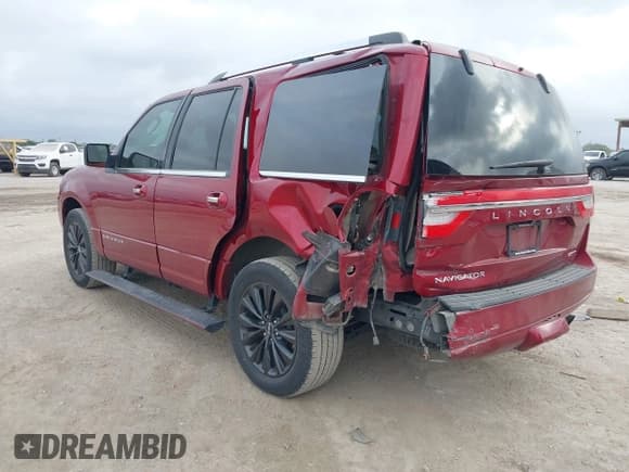 ✅ 2015 Lincoln Navigator • VIN: 5LMJJ2HT2FEJ01010 • Lot: 42454399. Listed on IAAI with 99,230 mi. Free auction sales archive from the USA and detailed vehicle history report at DreamBid. Image 3.