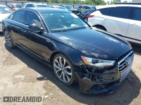 ✅ 2014 Audi A6 Prestige • VIN: WAUHGAFC9EN027338 • Lot: 42377190. Listed on IAAI with 164,427 mi. Free auction sales archive from the USA and detailed vehicle history report at DreamBid. Image 1.