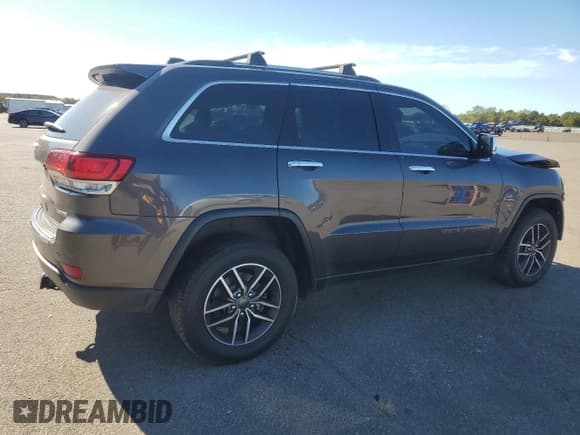 ✅ 2021 Jeep Grand Cherokee Limited • VIN: 1C4RJFBG9MC585957 • Lot: 82527095. Listed on Copart with 104,781 mi. Free auction sales archive from the USA and detailed vehicle history report at DreamBid. Image 3.