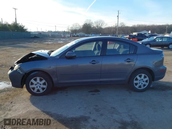 ✅ 2007 Mazda 3 i Sport • VIN: JM1BK12F771765771 • Lot: 41208925. Wystawiony na IAAI z przebiegiem 139 306 mil. Bezpłatny archiwum sprzedaży aukcyjnych z USA i szczegółowy raport historii pojazdu na DreamBid. Zdjęcie 14.