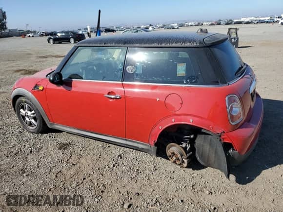 2011 MINI Hardtop with VIN WMWSU3C58BT183765, listed as a Copart auction lot 63061405 with 59,902 mi miles and Salvage title. Bid and sale history available at DreamBid. Image 2.