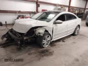 ✅ 2014 Volkswagen CC Executive • VIN: WVWRP7AN9EE519502 • Lot: 41458158. Listed on IAAI with 85,988 mi. Free auction sales archive from the USA and detailed vehicle history report at DreamBid. Image 2.