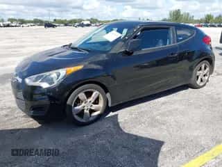 2015 Hyundai Veloster with VIN KMHTC6AD6FU229384, listed as a IAAI auction lot 43347439 with 144,004 mi miles and . Bid and sale history available at DreamBid. Image 2.