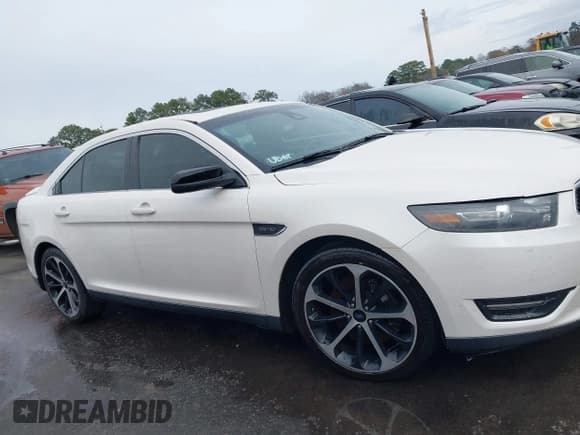 ✅ 2015 Ford Taurus SHO • VIN: 1FAHP2KTXFG158854 • Lot: 43689890. Listed on IAAI with 106,819 mi. Free auction sales archive from the USA and detailed vehicle history report at DreamBid. Image 13.