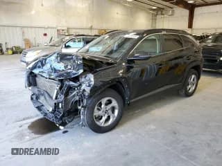 ✅ 2022 Hyundai Tucson SEL • VIN: 5NMJBCAE5NH038468 • Lot: 71234104. Wystawiony na Copart z przebiegiem 102 485 mil. Bezpłatny archiwum sprzedaży aukcyjnych z USA i szczegółowy raport historii pojazdu na DreamBid. Zdjęcie 1.