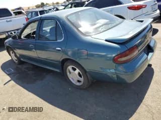 ✅ 1995 Nissan Altima GLE • VIN: 1N4BU31D9SC148820 • Lot: 69689864. Listed on Copart with 326,420 mi. Free auction sales archive from the USA and detailed vehicle history report at DreamBid. Image 2.