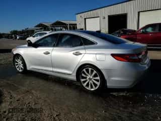 2013 Hyundai Azera z VIN KMHFH4JG2DA215302, wystawiony jako Copart lot #76708174 z przebiegiem 190 594 mil mil oraz Szkoda całkowita • Salvage title. Historia ofert i sprzedaży dostępna na DreamBid. Obrazek 2.