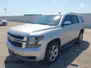 2017 Chevrolet Tahoe LT with VIN 1GNSCBKC9HR128335, listed as a IAAI auction lot 43198481 with 151,218 mi miles and . Bid and sale history available at DreamBid. Image 4.