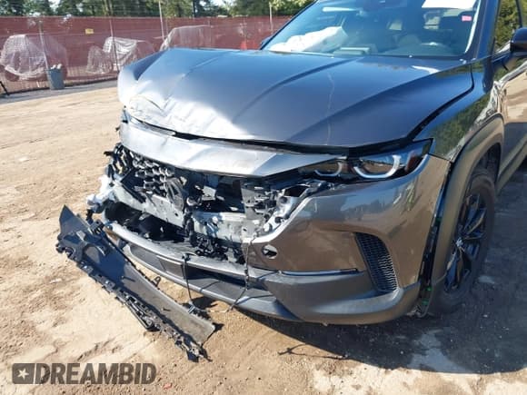 ✅ 2024 Mazda CX-50 S Preferred • VIN: 7MMVABBM7RN197831 • Лот: 43417747. Опубликован ранее на IAAI с пробегом 23 758 миль. Бесплатный доступ к архиву аукционных продаж из США и подробный отчёт об истории автомобиля на DreamBid. Изображение 21.