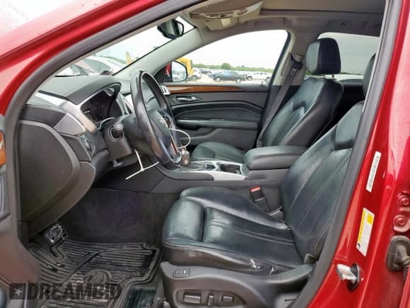 ✅ 2016 Cadillac SRX Premium Collection • VIN: 3GYFNDE39GS529630 • Lot: 59992585. Wystawiony na Copart z przebiegiem 107 010 mil. Bezpłatny archiwum sprzedaży aukcyjnych z USA i szczegółowy raport historii pojazdu na DreamBid. Zdjęcie 7.