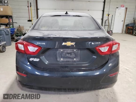 ✅ 2018 Chevrolet Cruze Premier • VIN: 1G1BF5SM2J7185111 • Lot: 46123173. Listed on Copart with 117,144 mi. Free auction sales archive from the USA and detailed vehicle history report at DreamBid. Image 6.