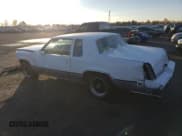 ✅ 1987 Oldsmobile Cutlass Supreme • VIN: 1G3GR11H9HP325067 • Lot: 87031215. Listed on Copart with 20,934 mi. Free auction sales archive from the USA and detailed vehicle history report at DreamBid. Image 2.