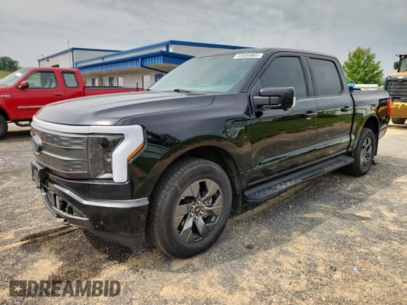 ✅ 2022 Ford F-150 Lightning Pro • VIN: 1FT6W1EV2NWG03104 • Лот: 65034965. Опубликован ранее на Copart с пробегом 124 442 миль. Бесплатный доступ к архиву аукционных продаж из США и подробный отчёт об истории автомобиля на DreamBid. Изображение 1.