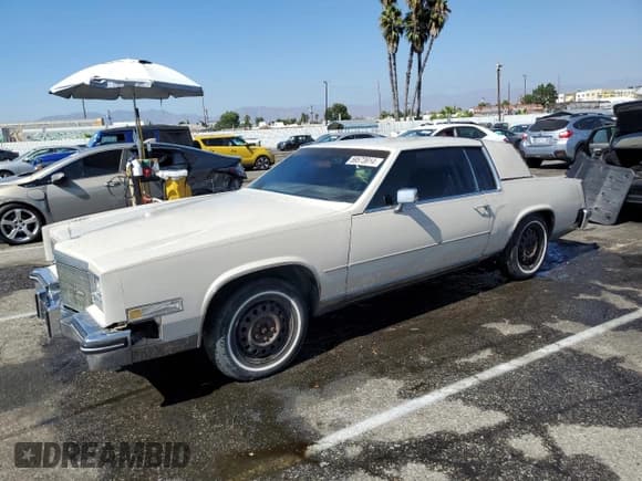 ✅ 1984 Cadillac Eldorado • VIN: 1G6AL5781EE675017 • Лот: 59573914. Опубликован ранее на Copart с пробегом 68 559 миль. Бесплатный доступ к архиву аукционных продаж из США и подробный отчёт об истории автомобиля на DreamBid. Изображение 1.