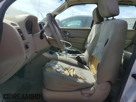 ✅ 2005 Mercury Mariner Convenience • VIN: 4M2YU56Z65DJ16579 • Лот: 48474465. Опубликован ранее на Copart с пробегом Не указан. Бесплатный доступ к архиву аукционных продаж из США и подробный отчёт об истории автомобиля на DreamBid. Изображение 7.