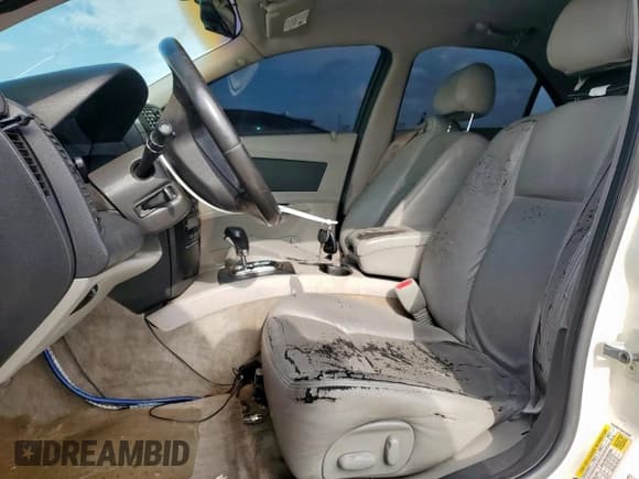 ✅ 2006 Cadillac CTS • VIN: 1G6DM57T060190090 • Lot: 62350065. Wystawiony na Copart z przebiegiem 280 690 mil. Bezpłatny archiwum sprzedaży aukcyjnych z USA i szczegółowy raport historii pojazdu na DreamBid. Zdjęcie 7.