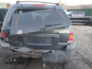 ✅ 2005 Ford Escape XLS Value • VIN: 1FMYU02Z25KB63243 • Lot: 43837346. Listed on IAAI with 162,313 mi. Free auction sales archive from the USA and detailed vehicle history report at DreamBid. Image 6.