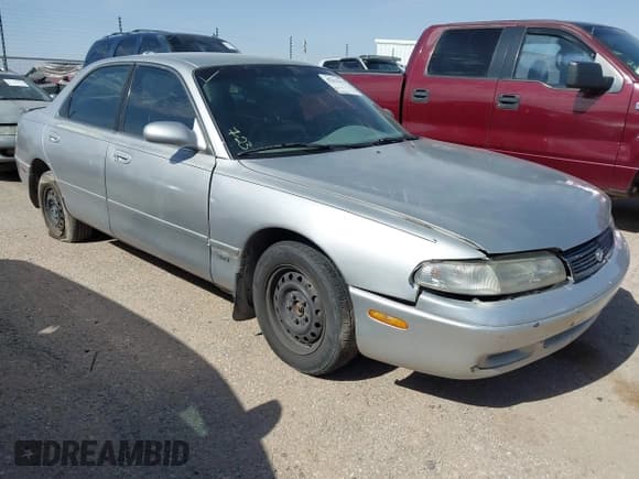 ✅ 1995 Mazda 626 DX • VIN: 1YVGE22C2S5375147 • Lot: 42821433. Listed on IAAI with 201,088 mi. Free auction sales archive from the USA and detailed vehicle history report at DreamBid. Image 1.