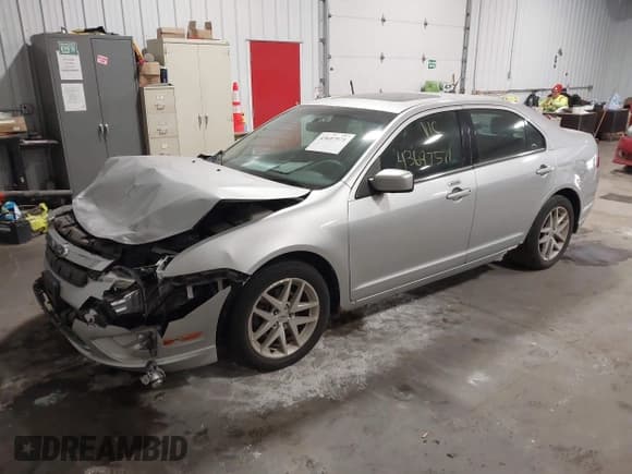 ✅ 2012 Ford Fusion SEL • VIN: 3FAHP0JG5CR328048 • Лот: 43697571. Опубликован ранее на IAAI с пробегом 143 416 миль. Бесплатный доступ к архиву аукционных продаж из США и подробный отчёт об истории автомобиля на DreamBid. Изображение 17.