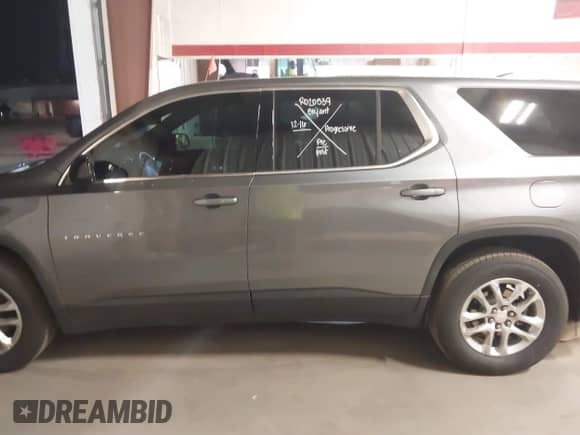 2020 Chevrolet Traverse LS with VIN 1GNERLKW5LJ153784, listed as a IAAI auction lot 41157698 with 94,672 mi miles and . Bid and sale history available at DreamBid. Image 14.
