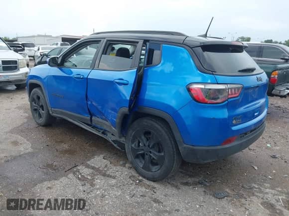 2021 Jeep Compass Latitude with VIN 3C4NJDBB2MT595256, listed as a IAAI auction lot 43058271 with 102,541 mi miles and . Bid and sale history available at DreamBid. Image 3.