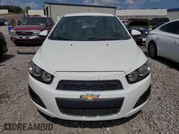 2016 Chevrolet Sonic LS с VIN 1G1JA6SH0G4164321, выставлен на аукционе Copart как лот 66323844 с пробегом 113 098 миль миль и Списание • Salvage title. История ставок и продаж доступна на DreamBid. Изображение 5.