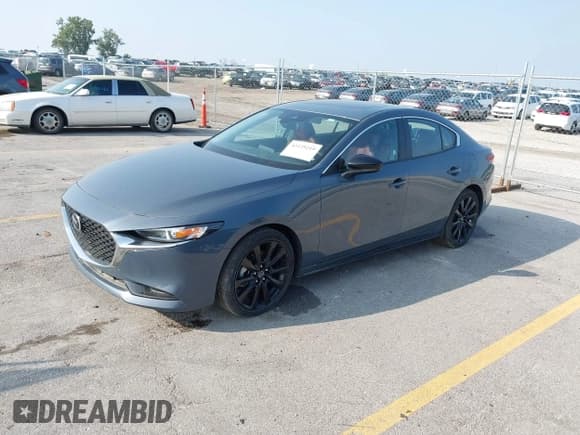 ✅ 2023 Mazda 3 S Carbon Edition • VIN: 3MZBPBCM0PM359965 • Лот: 43125219. Опубликован ранее на IAAI с пробегом 31 971 миль. Бесплатный доступ к архиву аукционных продаж из США и подробный отчёт об истории автомобиля на DreamBid. Изображение 19.