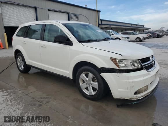 ✅ 2013 Dodge Journey American Value • VIN: 3C4PDCABXDT531901 • Lot: 87020735. Listed on Copart with 212,961 mi. Free auction sales archive from the USA and detailed vehicle history report at DreamBid. Image 4.