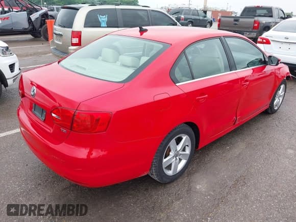 ✅ 2014 Volkswagen Jetta TDI w/Premium/Nav • VIN: 3VWLL7AJ4EM383351 • Lot: 42424074. Listed on IAAI with 66,824 mi. Free auction sales archive from the USA and detailed vehicle history report at DreamBid. Image 4.