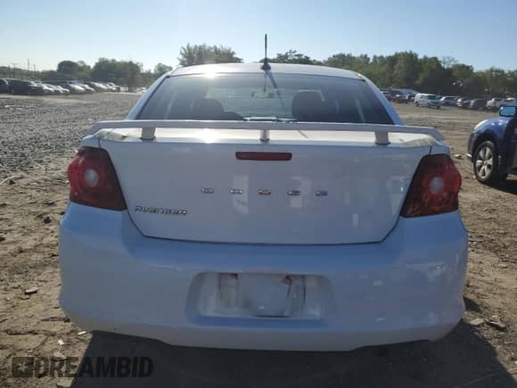 2013 Dodge Avenger SE с VIN 1C3CDZAB0DN644696, выставлен на аукционе Copart как лот 69927534 с пробегом 128 322 миль миль и Списание • Salvage title. История ставок и продаж доступна на DreamBid. Изображение 6.