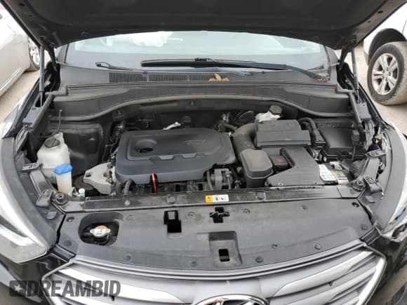 ✅ 2018 Hyundai Santa Fe 2.4L • VIN: 5NMZTDLB3JH077563 • Лот: 65330622. Опубликован ранее на Copart с пробегом 65 169 миль. Бесплатный доступ к архиву аукционных продаж из США и подробный отчёт об истории автомобиля на DreamBid. Изображение 12.