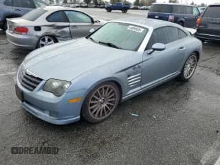 ✅ 2005 Chrysler Crossfire SRT-6 • VIN: 1C3AN79N35X039973 • Лот: 44098695. Опубликован ранее на Copart с пробегом 109 161 миль. Бесплатный доступ к архиву аукционных продаж из США и подробный отчёт об истории автомобиля на DreamBid. Изображение 1.