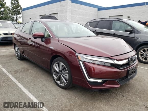 ✅ 2018 Honda Clarity • VIN: JHMZC5F19JC023948 • Lot: 49714953. Listed on Copart with 65,975 mi. Free auction sales archive from the USA and detailed vehicle history report at DreamBid. Image 4.