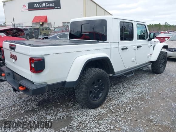 ✅ 2020 Jeep Gladiator Mojave • VIN: 1C6JJTEG7LL206581 • Lot: 41247922. Listed on IAAI with 27,876 mi. Free auction sales archive from the USA and detailed vehicle history report at DreamBid. Image 4.